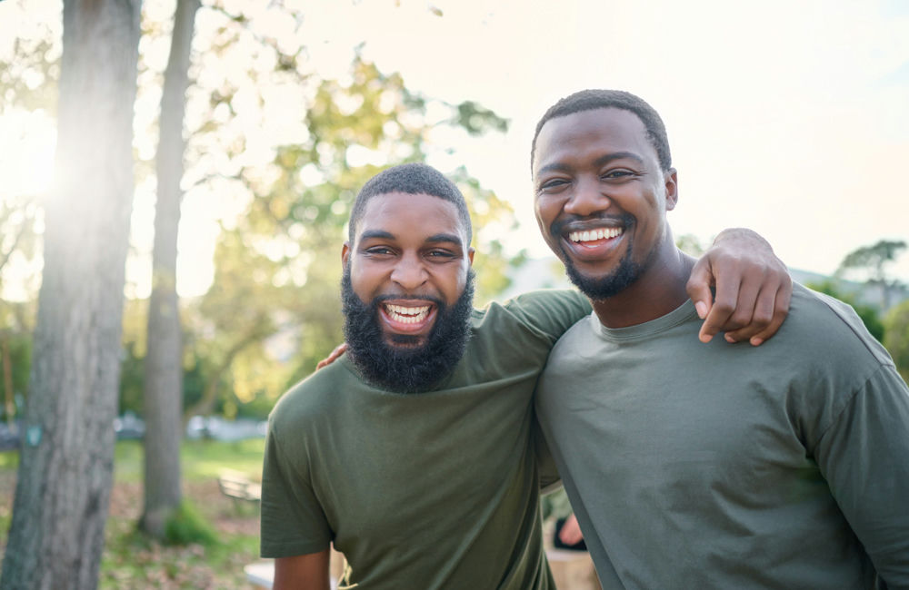 two-men-smiling-outside