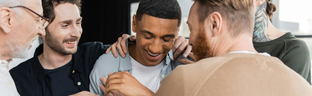 a-man-being-comforted-in-therapy